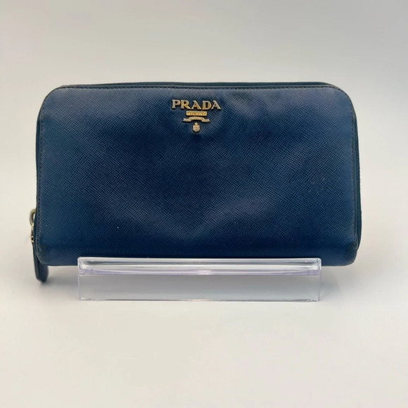 Prada Handbags - Prada large zip-around wallet in durable Saffiano leather